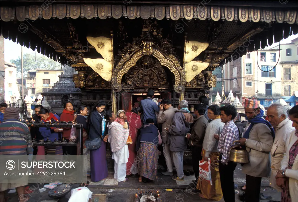 Nepal, Katmandu. Worshippers Swoyambhunath temple