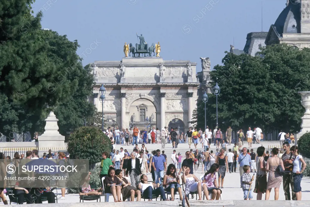 Arc de Triomphe du Carrousel at Jardin des Tuileries sculpture garden with the Louvre in back, Paris, France