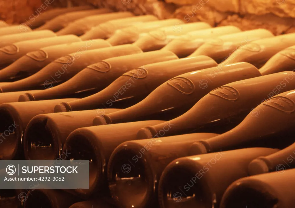 France, Champagne Ardenne, Urville, Maison Drappier, champagne bottles in cellar