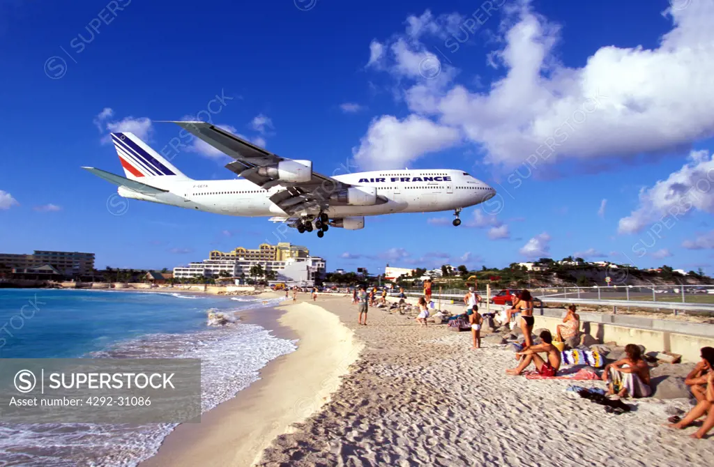Sint Maarten airplane (boeing 747) landing at Maho bay airport Caribbean