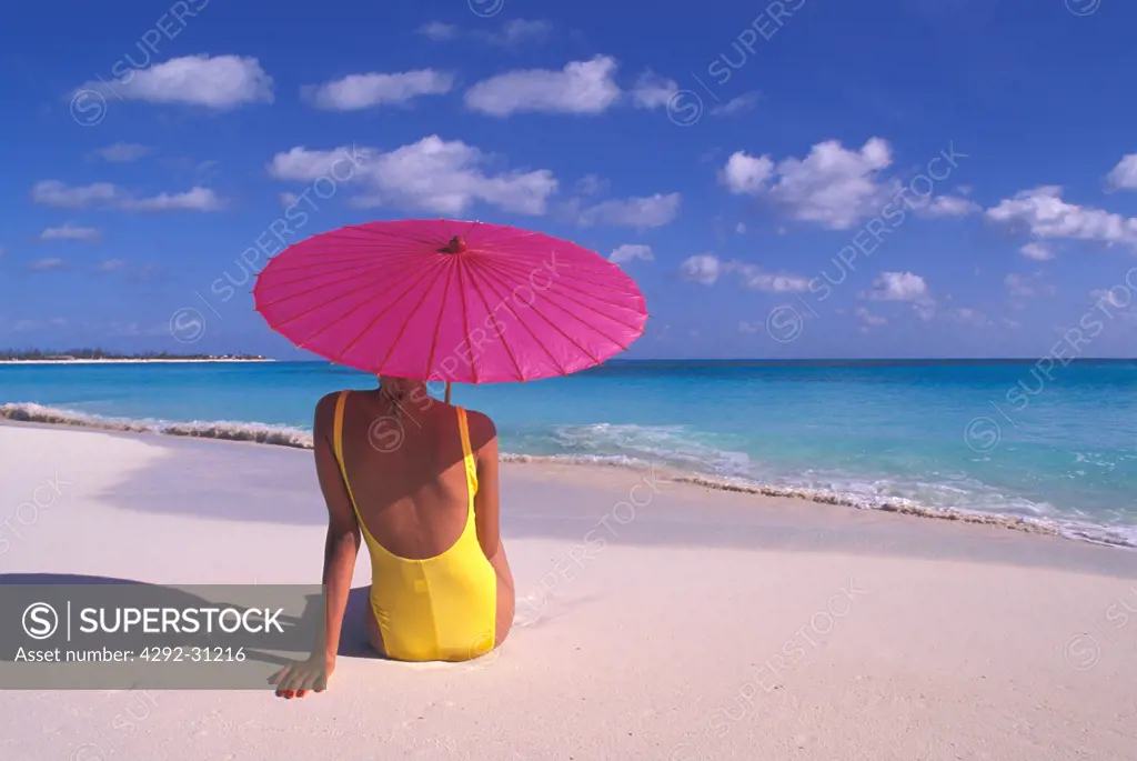 Cuba, woman on tropical beach Cayo Largo
