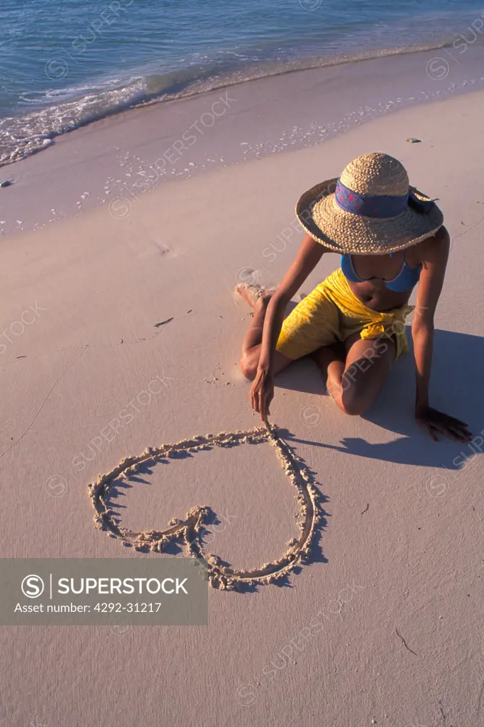 Woman on tropical beach Cayo largo Cuba