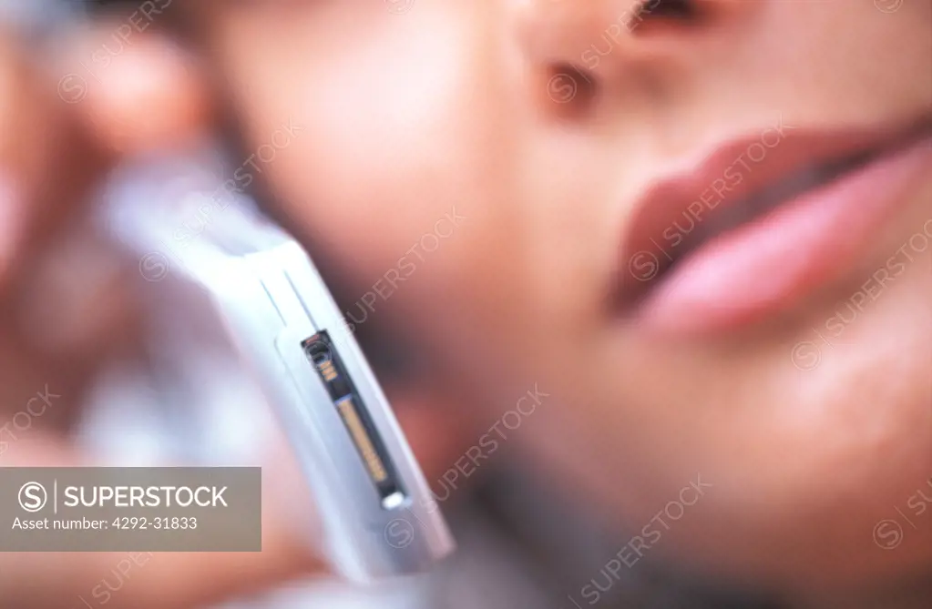 Woman with mobile phone close up