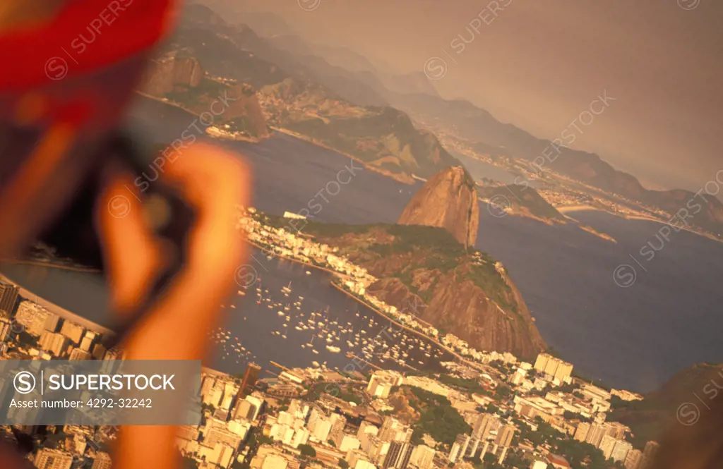 Brazil, Rio de Janeiro, Corcovado. Tourist at Cristo Redentor statue