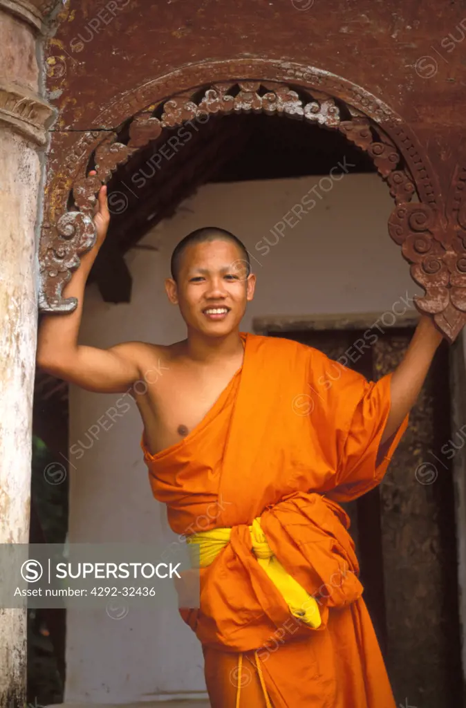 Laos, Luang Prabang. Monk in monastery