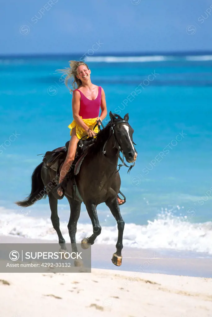 Caribbean, Santo Domingo. Punta Cana. Woman horseback riding