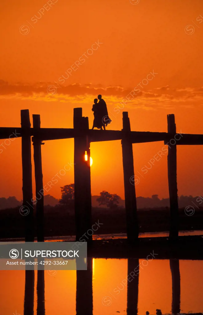 Burma, Mandalay, U Bein Bridge on Taungthaman Lake at sunset