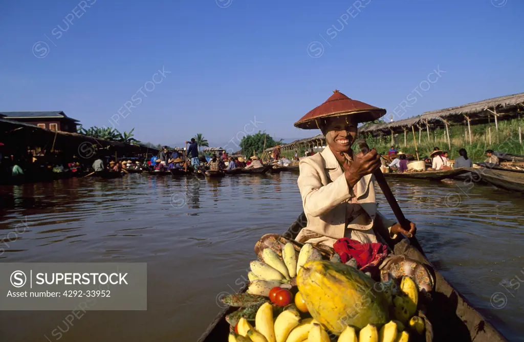 Myanmar, Shan State, Inle lake. Woman at Inwa floating market