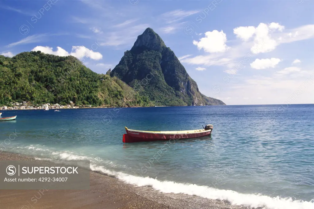 Caribbean, St. Lucia Soufrière, fishing boat in the bay and Petit Piton