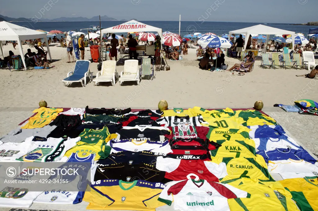 Brazil, Rio De Janeiro, Copacabana Beach.Football (Soccer) Teams shirts sold on Copacabana beach.