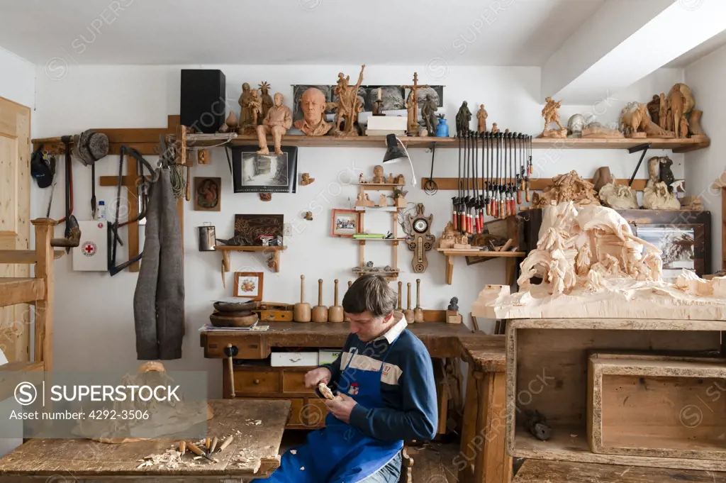 Italy, Trentino Alto Adige, Ortisei, artist Georg Demetz carving wood