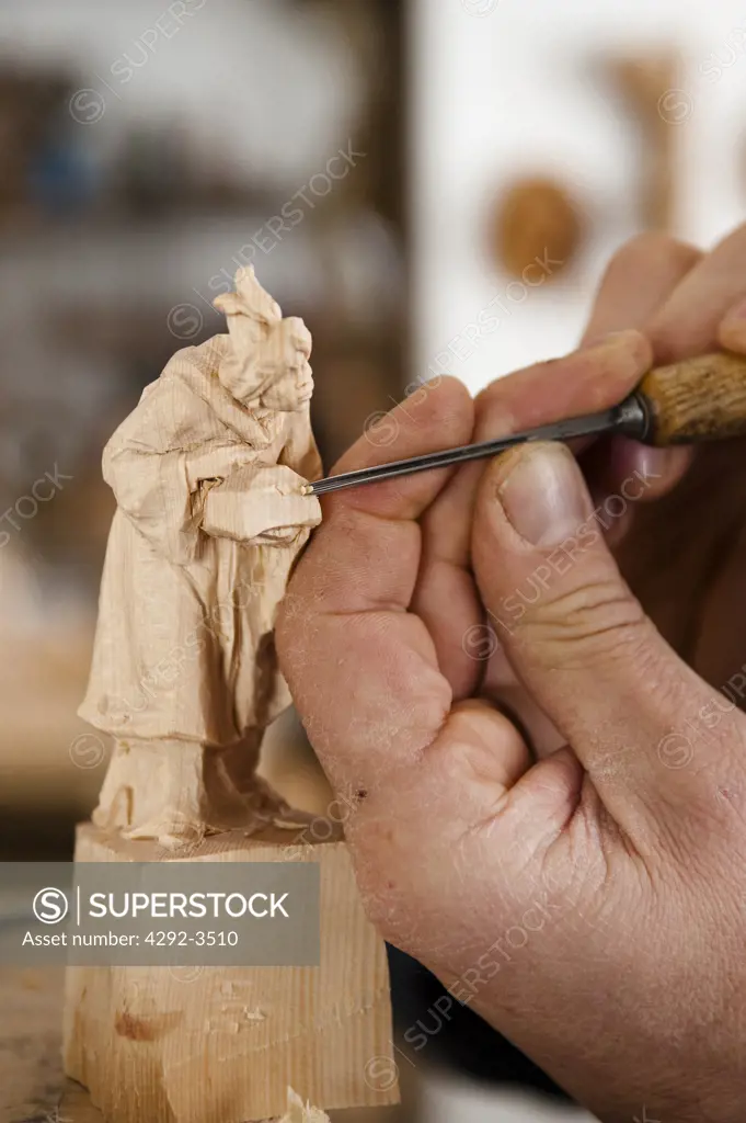 Italy, Trentino Alto Adige, Ortisei, artist Georg Demetz carving wood