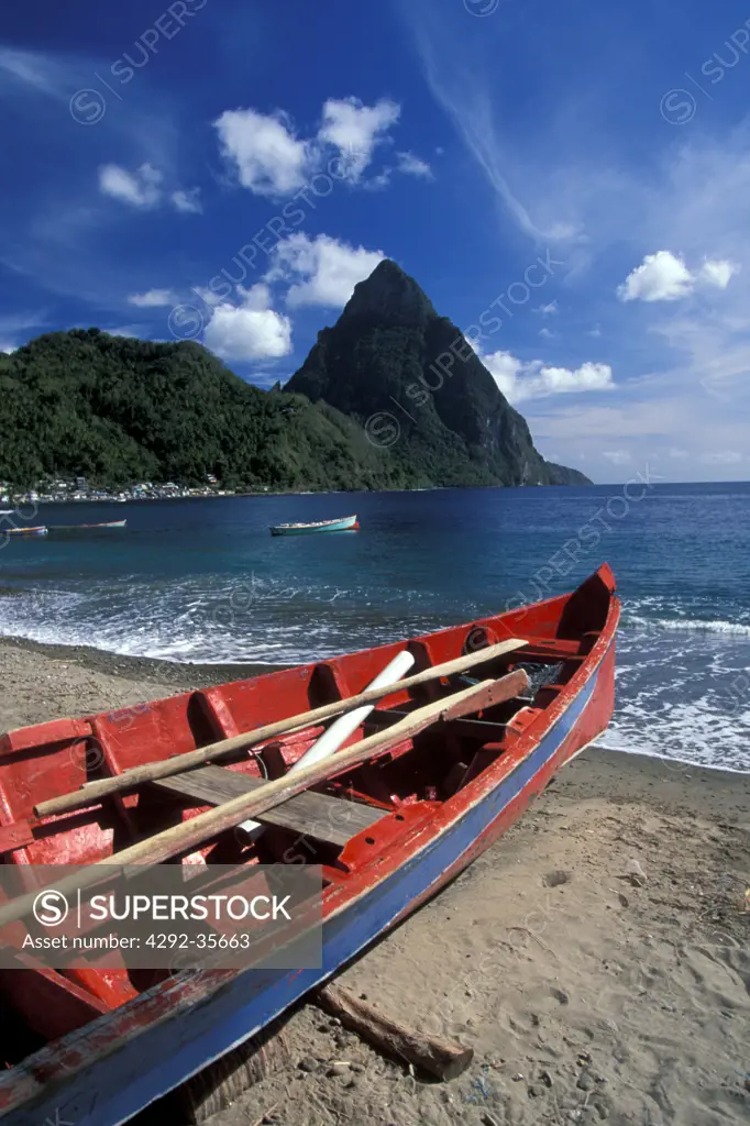 Caribbean, St. Lucia Soufrière, fishing boat in the bay and Petit Piton