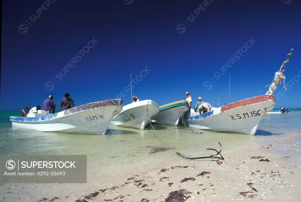 Mexico, Yucatan, Celestun. Fishing boats on beach