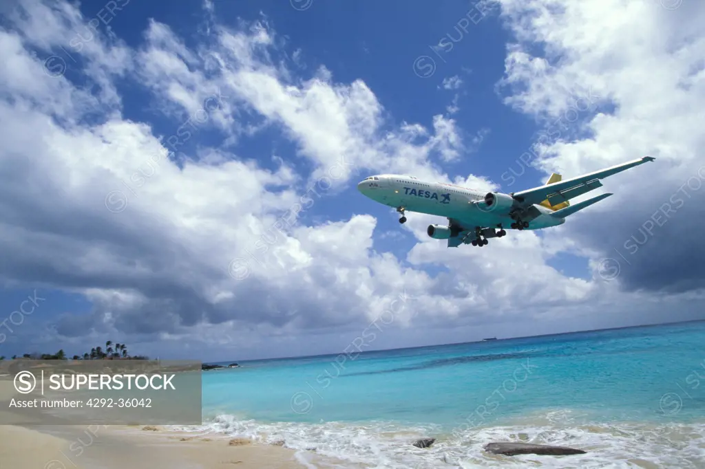 Sint Maarten, airplane landing at Maho bay airport Caribbean