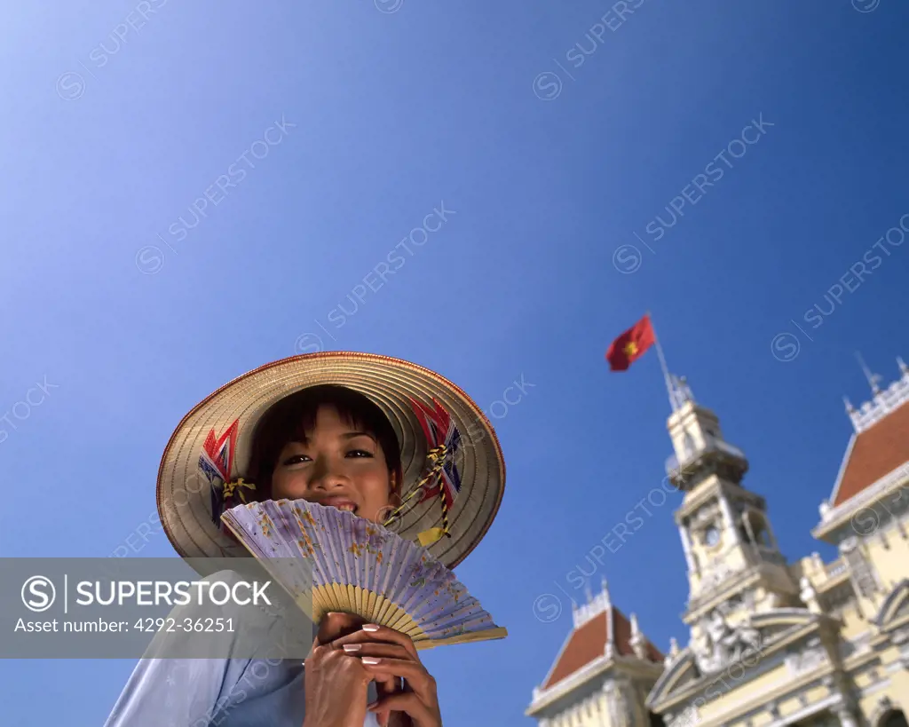Vietnam, Hochiminville city hall and vietnamese girl