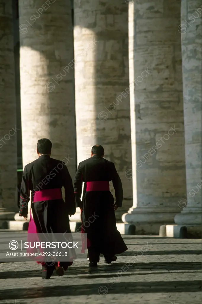 Italy, Lazio, Rome, priests walking in Saint Peters Square