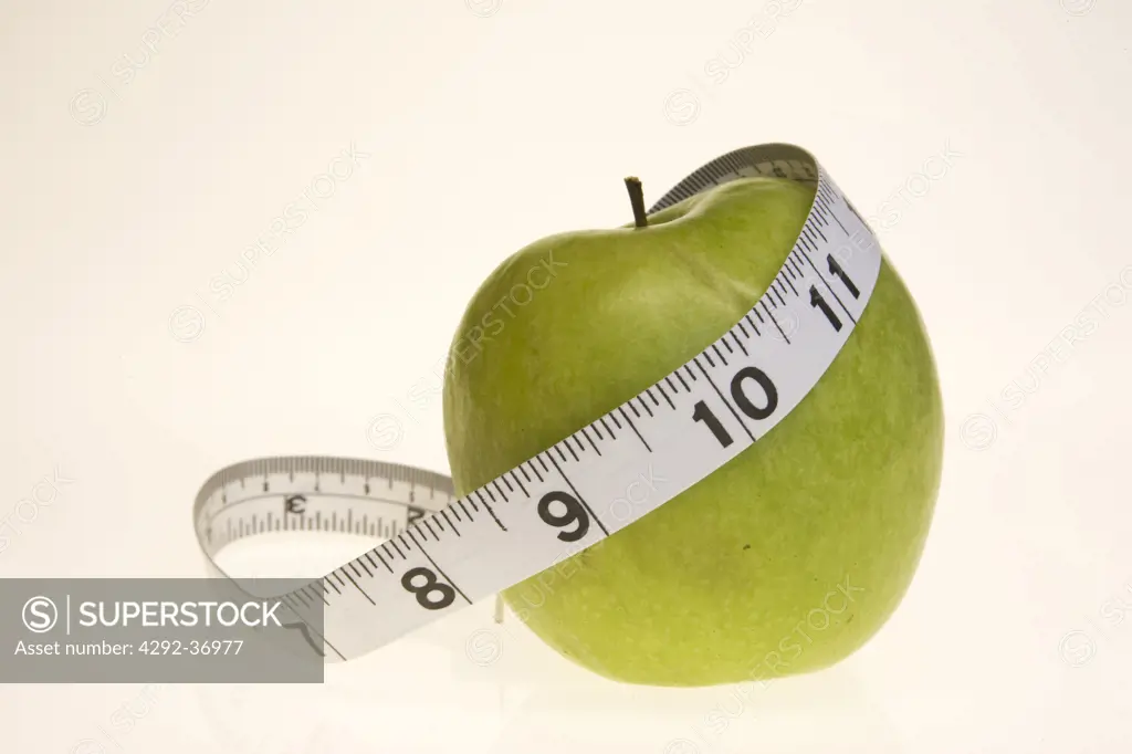 Apple with tape measure