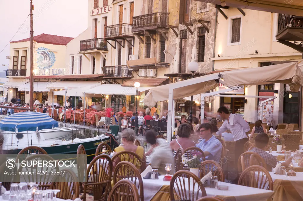 Europe, Greece, Western Crete, Rethymnon, restaurants in the Venetian harbour at dusk