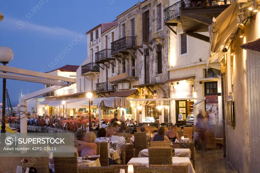 Europe, Greece, Western Crete, Rethymnon, restaurants in the Venetian harbour at dusk