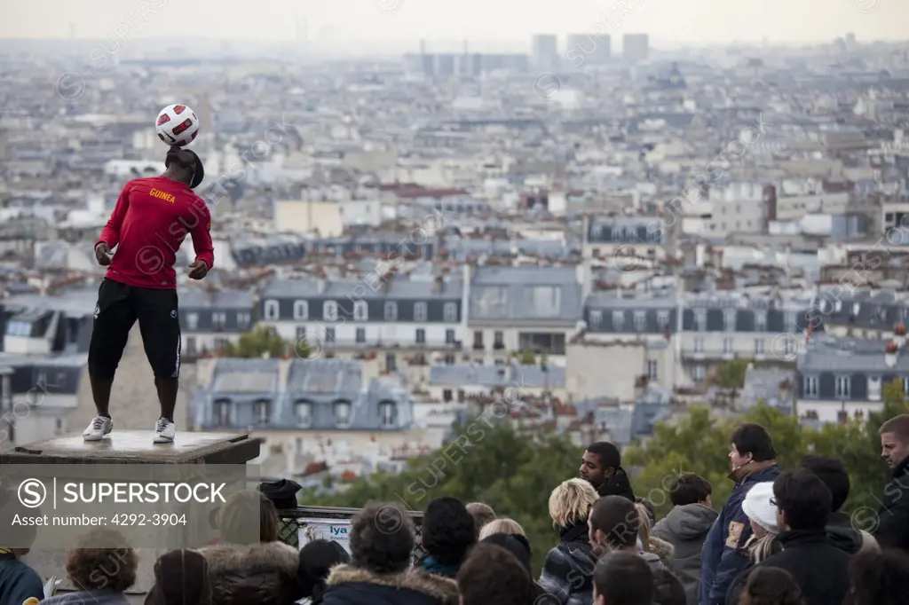 France, Paris, a Man Performing  Playing Soccer
