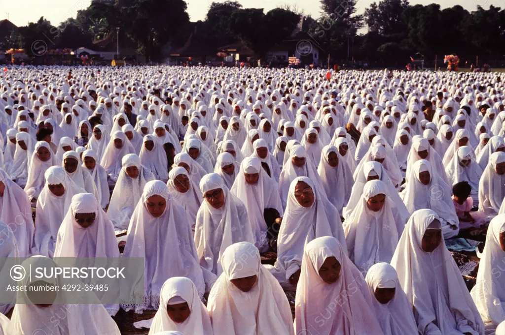 Muslim women at prayer. Java, Indonesia