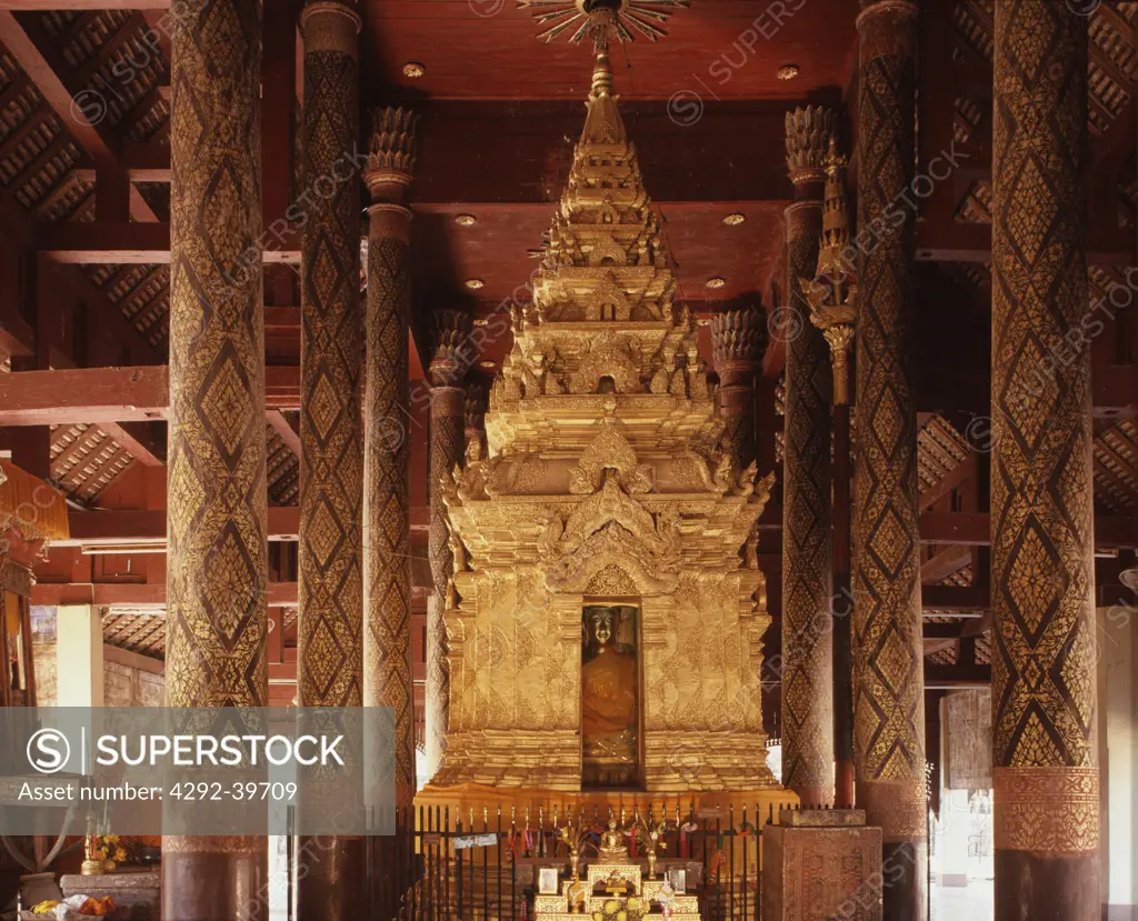 Interior of wat Phra That Lampang Luang, Lampang, with a typical northern ""Ku"" housing the main Buddha image, Lampang,Thailand.