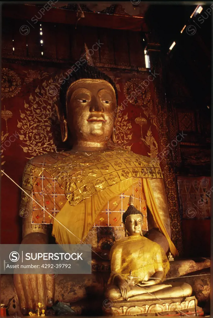 interior of Wat Hua Khuang, Lampang, with Buddha images in Lanna style.Thailand.