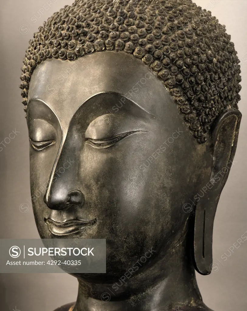 Head of a bronze Buddha image of Sukhothai period, National Museum, Bangkok,Thailand.