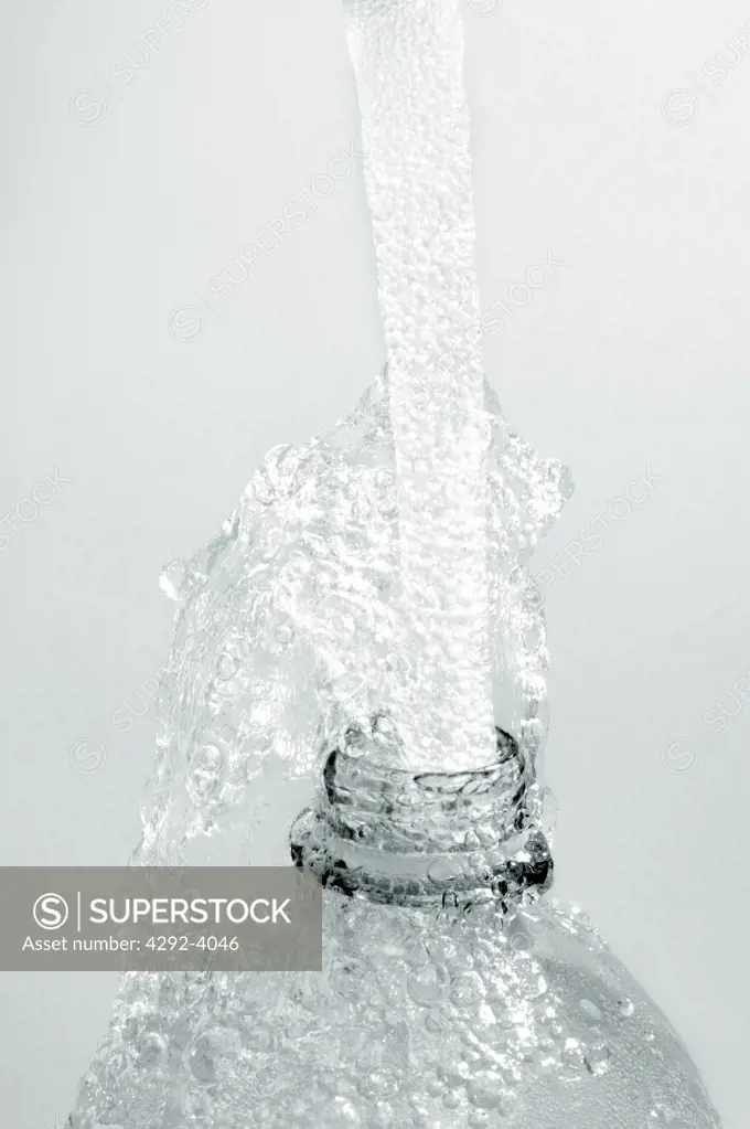 Water Being Poured from a Bottle