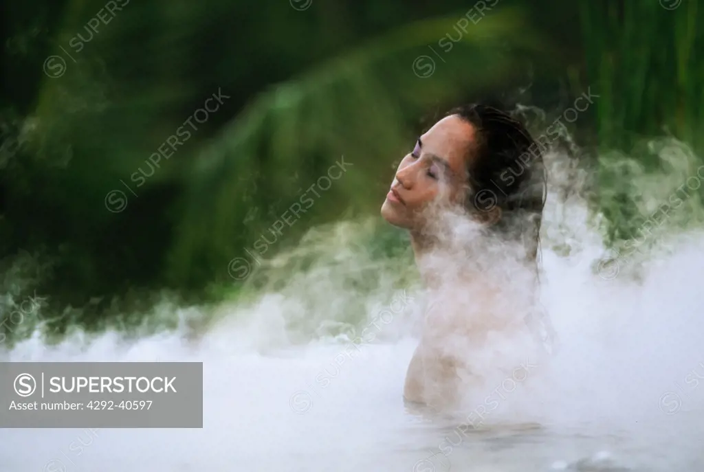 Bali, Ubud, Kirana Spa, woman in thermal pool