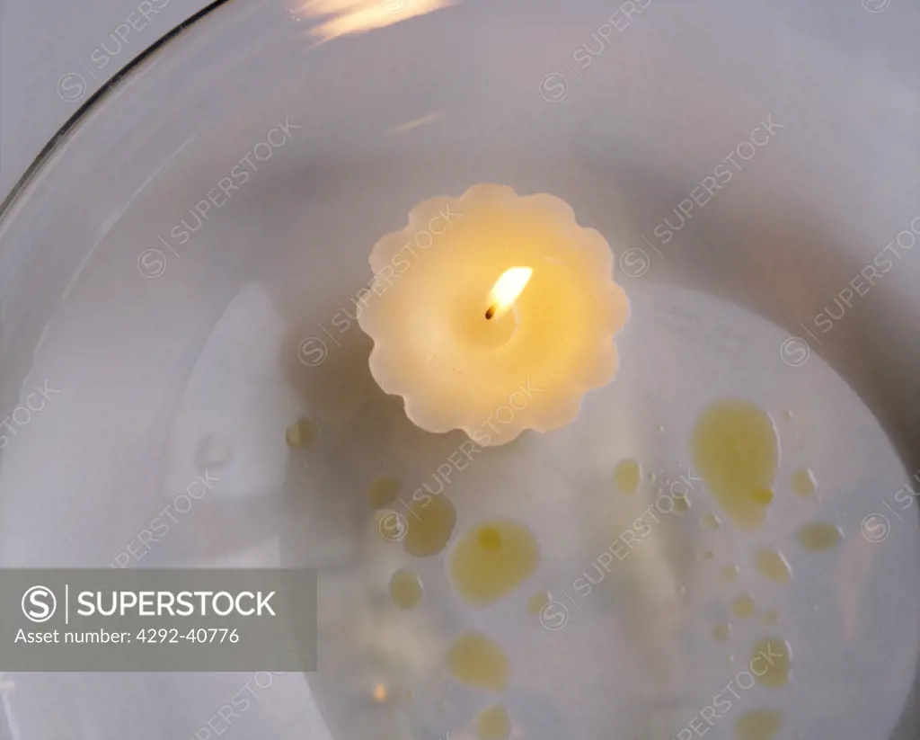 Candle and oil drops