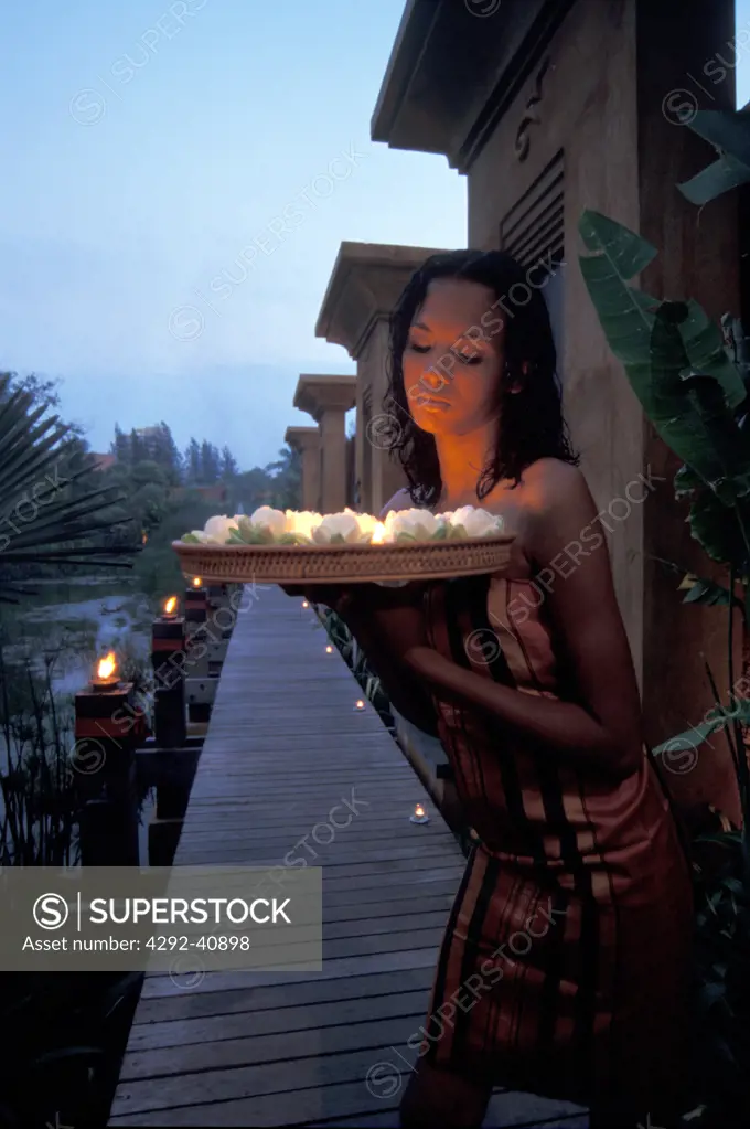 Woman with candles. Anantara Spa, Hua Hin ,Thailand
