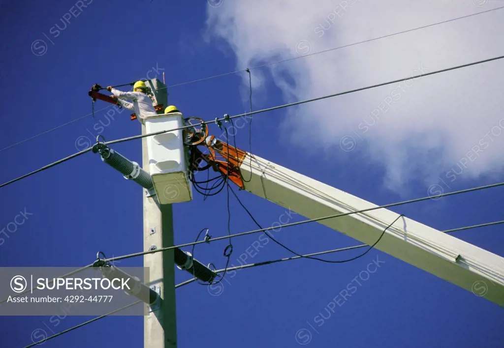 Man working on power lines