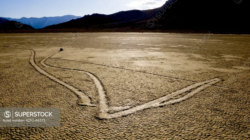 Recetrack of a rolling Rock. Death Valley National Park, California,  USA