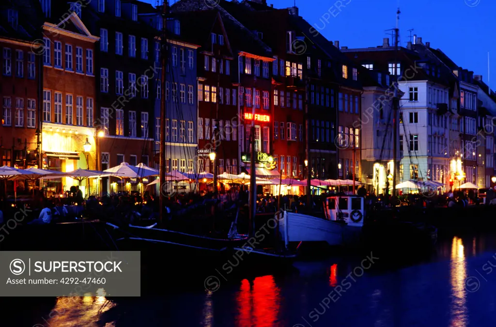 Denmark, Copenhagen, Nyhaven harbour by night