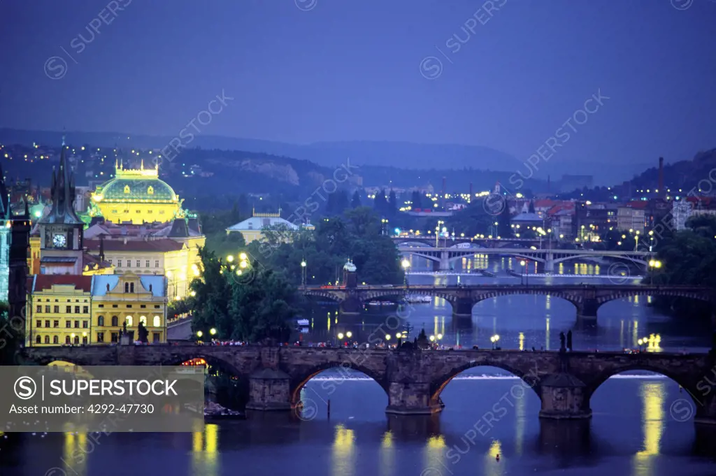 Czech Republic, Prague, Vltava River, National Theatre and bridges by night