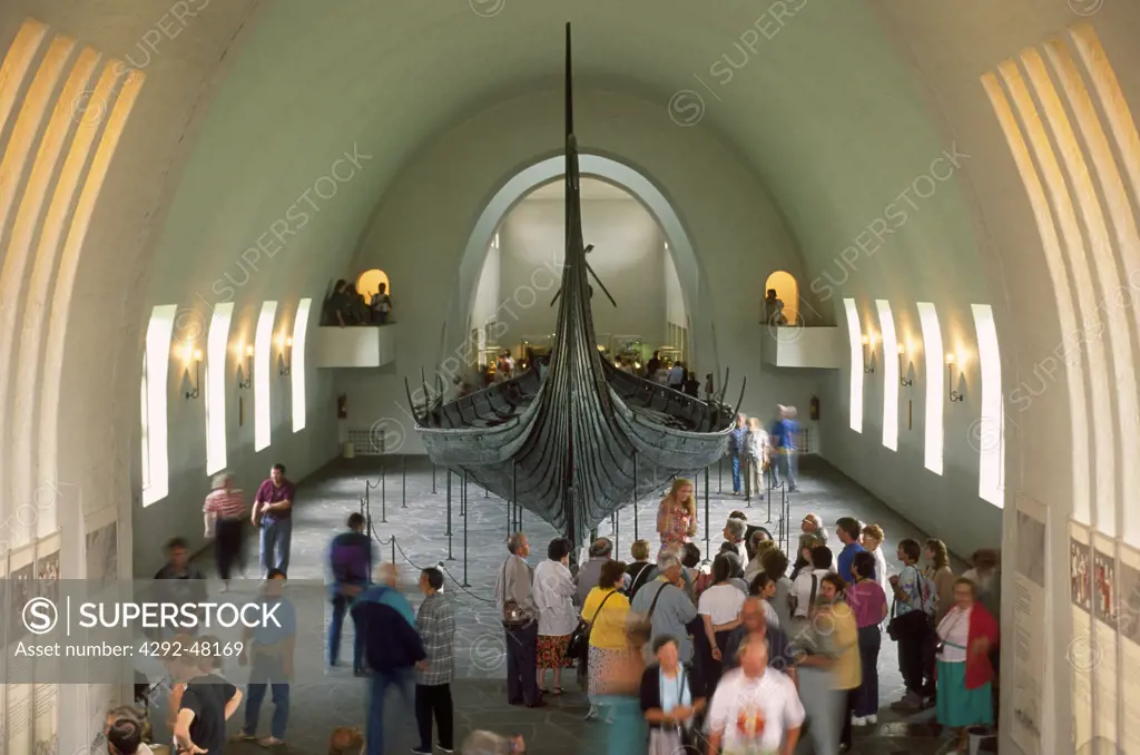 Norway, Oslo, the Viking museum, visitors looking ship