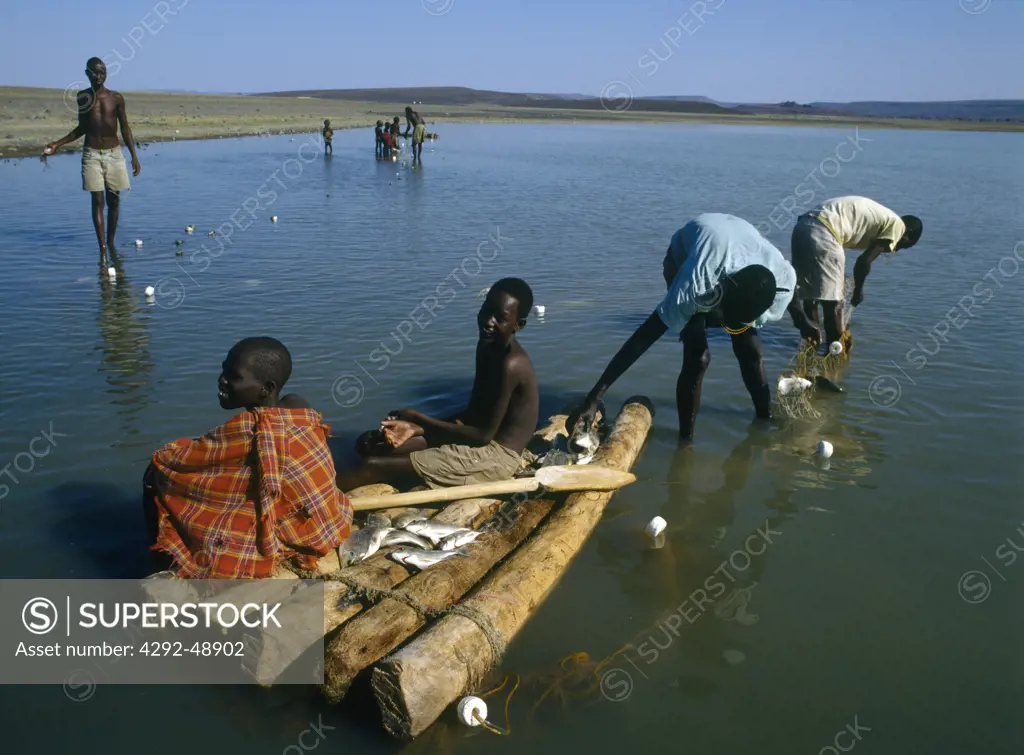 Africa, Kenya: El Molo tribe fishing and raft