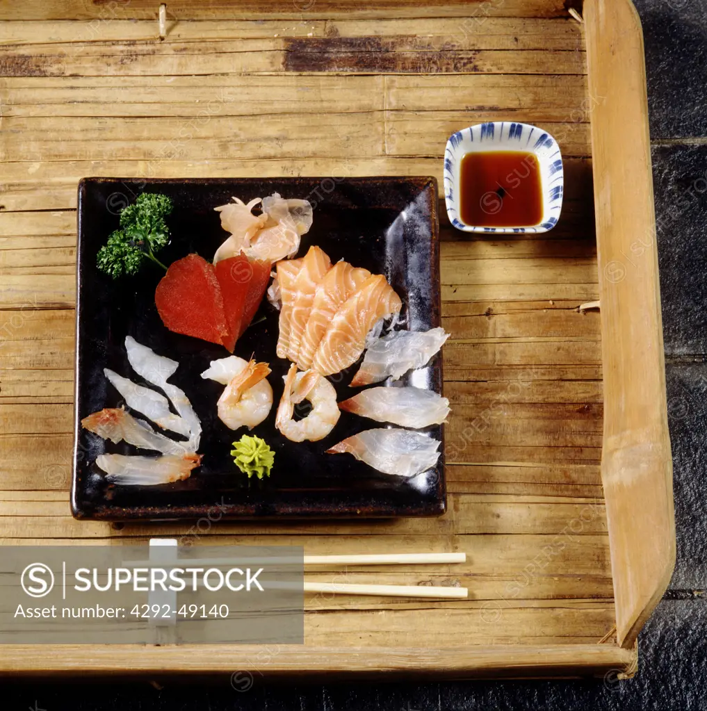 Japanese cuisine: Sashimi mix, sea bream, sea-bass, tuna, salmon, prawn, octopus and soya