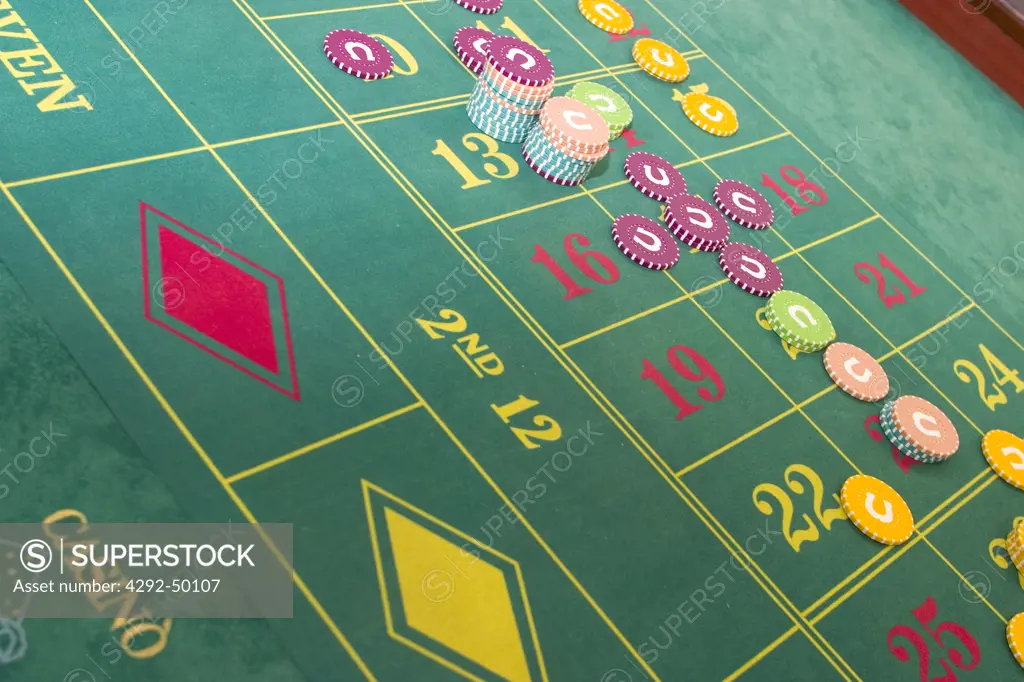 Gambling chips on roulette table