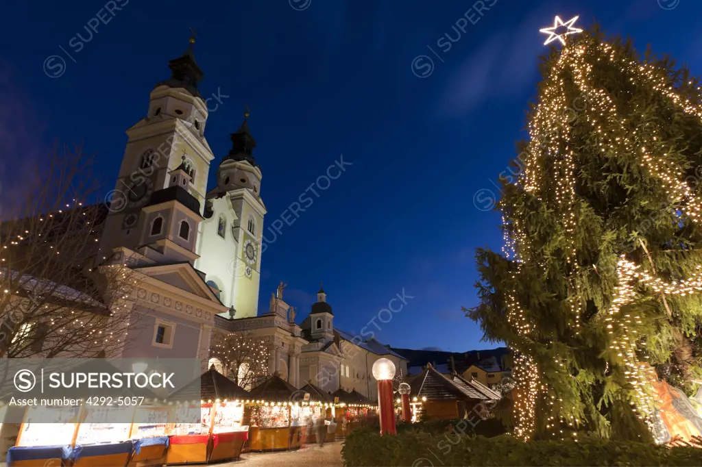 Italy, Trentino Alto Adige, Bressanone, the cathedral and the Christmas market at night