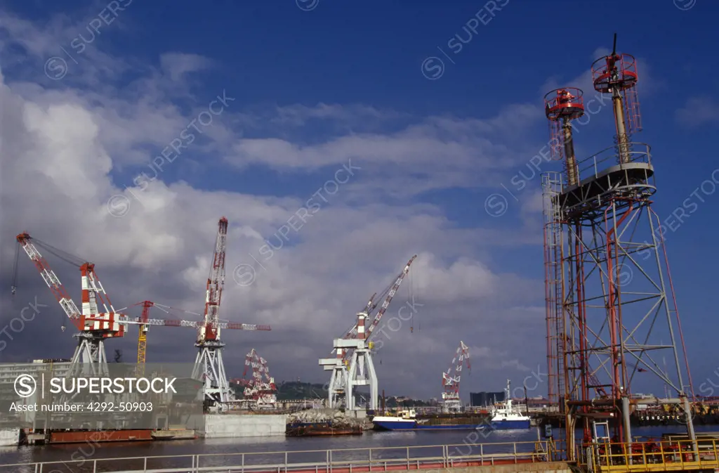 Italy, Genoa. Cranes in port