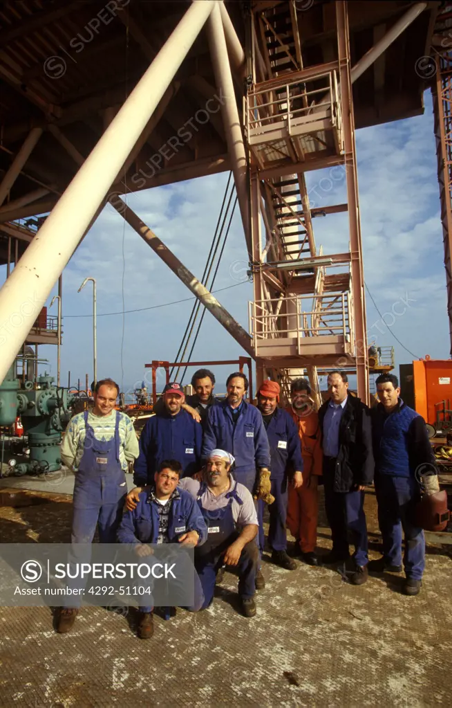 Group photo of workers on an oil rig (no property release)