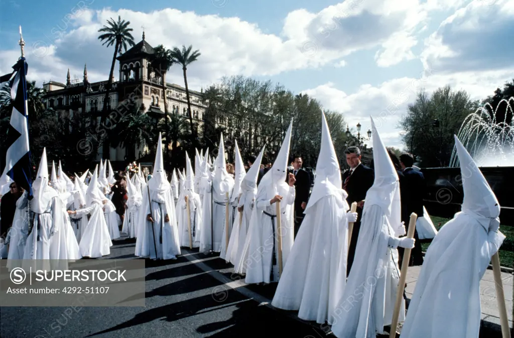 Spain, Andalusia, Seville, ""Nazarenos"" during the Semana Santa (holy week)