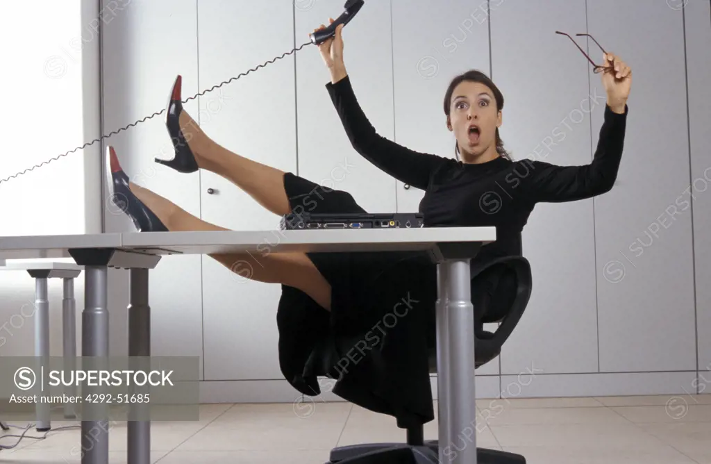 Surprised businesswoman in office