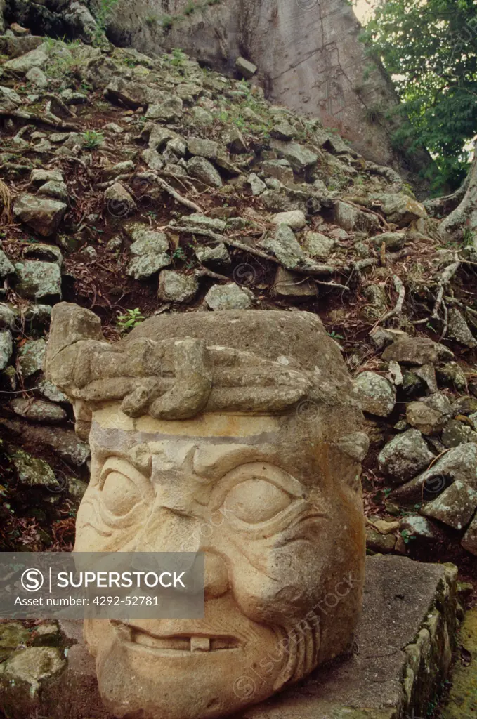 Honduras, Copan, statue of Pauatan or 'the old man'