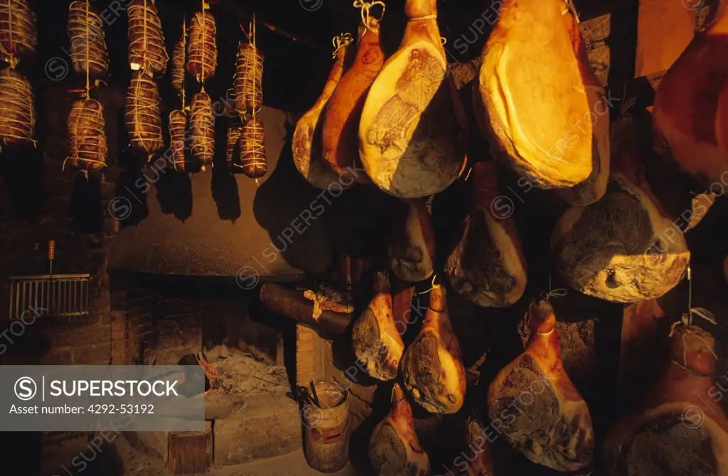 Seasoning ham and loin, butchers shop, Umbria, Italy