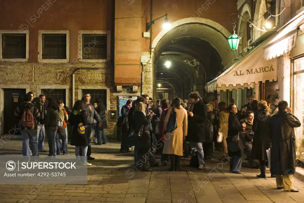 Italy, Veneto, Venice, People having a drink near Rialto