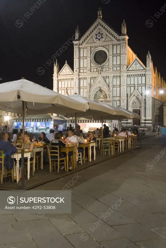 Tuscany, Florence, Santa Croce church, People having dinner in Santa Croce square